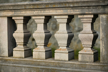 Close up of a row of classic outdoor banisters