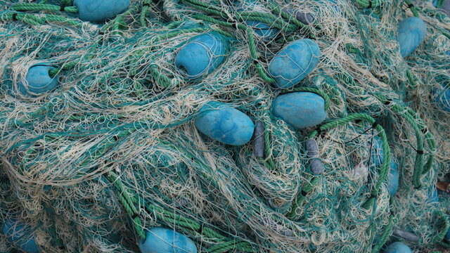 fishing nets and floats in the harbor