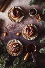 Fototapeta na wymiar christmas chocolate muffins with nuts