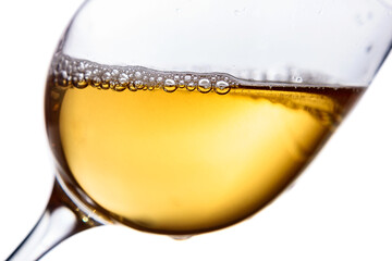 Glass of white wine on white background.