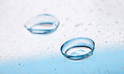contact lenses with droplets around close up view  - Image