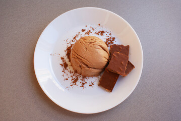 Delicious milk chocolate dessert, chocolate with nuts.