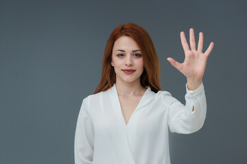 Beautiful smiling Turkish young woman, gestures concept, five tips and tricks concept includes copy space.