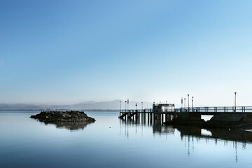 Pier over lake Trasimeno , Italy