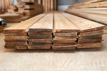 The lumber cut in the forest lie in piles