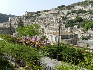 Fototapeta premium Modica, Sicily, Cityscape with Flowers
