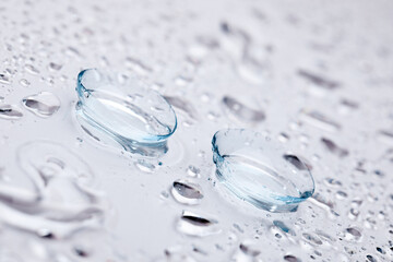 contact lenses with droplets around close up view  - Image