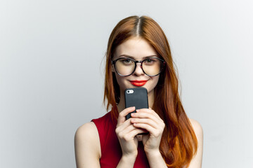 pretty woman with glasses talking on the phone technology lifestyle