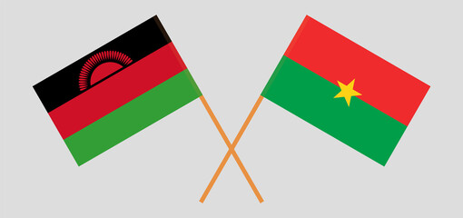 Crossed flags of Malawi and Burkina Faso. Official colors. Correct proportion