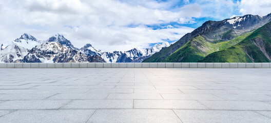 Empty square floor and snow mountain background