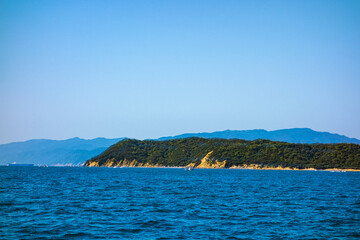 Fototapeta na wymiar 船上から見た海のある風景