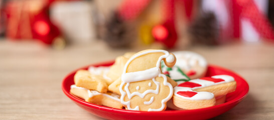 Merry Christmas with homemade cookies on wood table background. Xmas, party, holiday and happy New Year concept