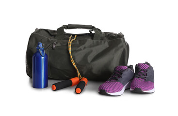 Sports bag and gym equipment on white background