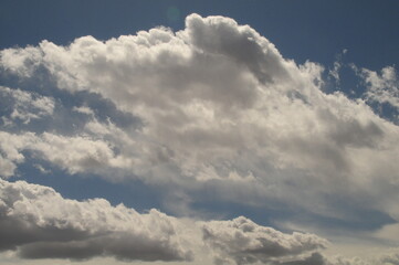 Fototapeta na wymiar Clouds in a sunny sky