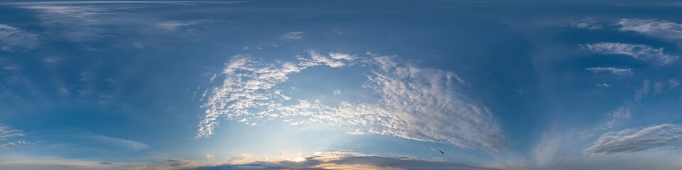 Dark blue sunset sky panorama with Cirrus clouds. Seamless hdr pano in spherical equirectangular format. Complete zenith for 3D visualization, game and sky replacement for aerial drone 360 panoramas.