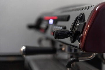 Close-up detail of a professional coffee machine.