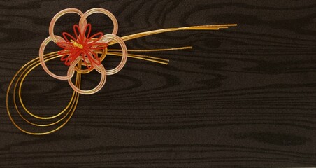 黒い背景に赤いリボンと水引、日本のギフト用の背景素材