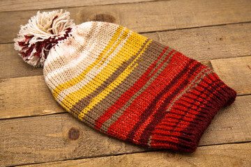 Handmade wool knitted winter red yellow and brown hat