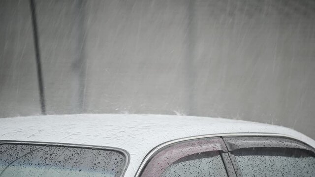 Raining on roof car in rainy season