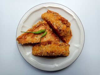 Fried crackers filled by ragout, vegetarian snack popular in Indonesia. Isolated on white background.
