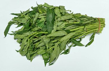 A bunch of Ipomoea aquatica, isolated on white background