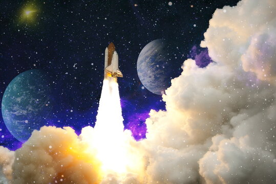 Rockets launch into space on the starry sky. spacecraft flies into space with clouds of smoke. Elements of this image furnished by NASA