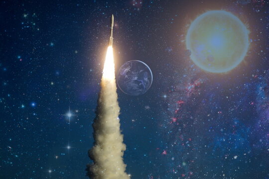 Space shuttle taking , Spaceship lift off with blast and smoke on the background of the blue planet earth and sunset.Elements of this image furnished by NASA