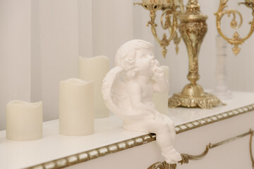 white piano with candles