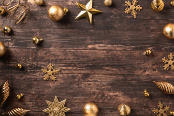 Obraz na płótnie Canvas Christmas bauble ball decoration ornament on brown rustic table background