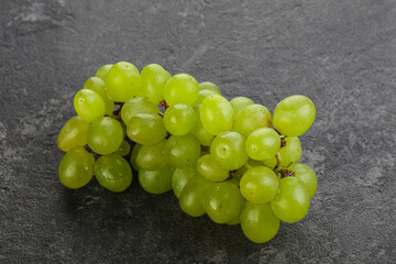 Ripe sweet green grape branch