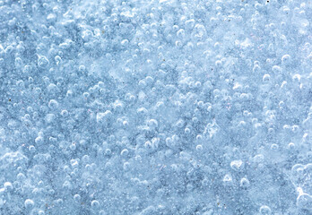 Fototapeta na wymiar Blue crystals of snow and ice as an abstract background.