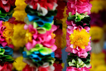 garland of marigold flower hanged in indian temple