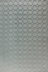 Perforated panel with geometric decorative metal design