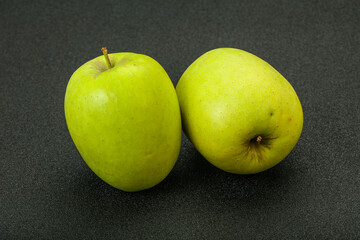 Two ripe green sweet apples