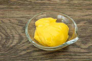 Natural cheese sauce in the bowl