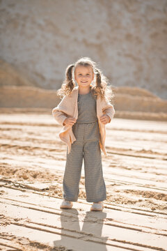 A girl against the background of sand and sky 3338.