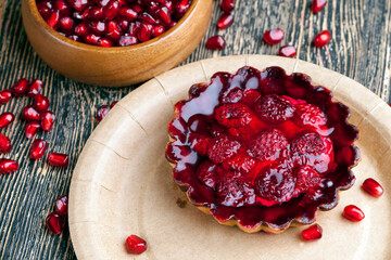 a cake with raspberry jam and cream filling