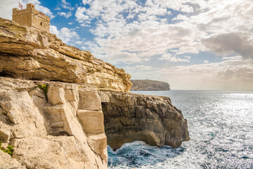 Fototapeta na wymiar View at the Edges near Wied Izzurrieq village with Xutu watchtower, Malta