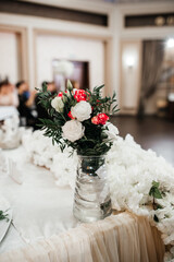 beautifully set table at a wedding banquet with delicious food and alcohol