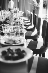 beautifully set table at a wedding banquet with delicious food and alcohol