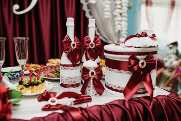 beautifully set table at a wedding banquet with delicious food and alcohol