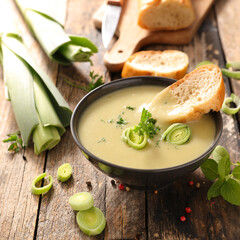 leek soup and bread slice in bowl