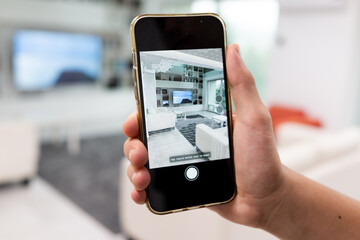 Decorating Apartment with Augmented Reality Interior Design Software. High quality photo