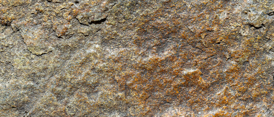 Cracked granite stone texture. Granite rock surface. Natural stone backdrop