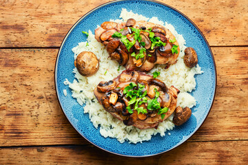 Chicken breast with marsala sauce and rice