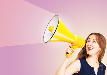 Successful woman with megaphone. Girl reports something. Yellow megaphone in woman's hand. Portrait...