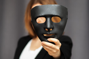 actor with a mask before theatrical performance rehearses role in theater