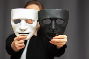 actor with masks at the opera theater plays theatrical play tragic comedy in different roles