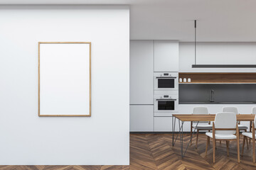 Empty canvas on white wall and minimalist white kitchenroom