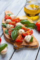 Italian caprese salad with mozzarella cheese